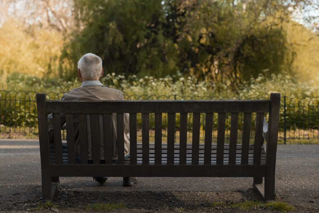 Old man sitting on a bench