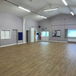 Wide shot of the village hall